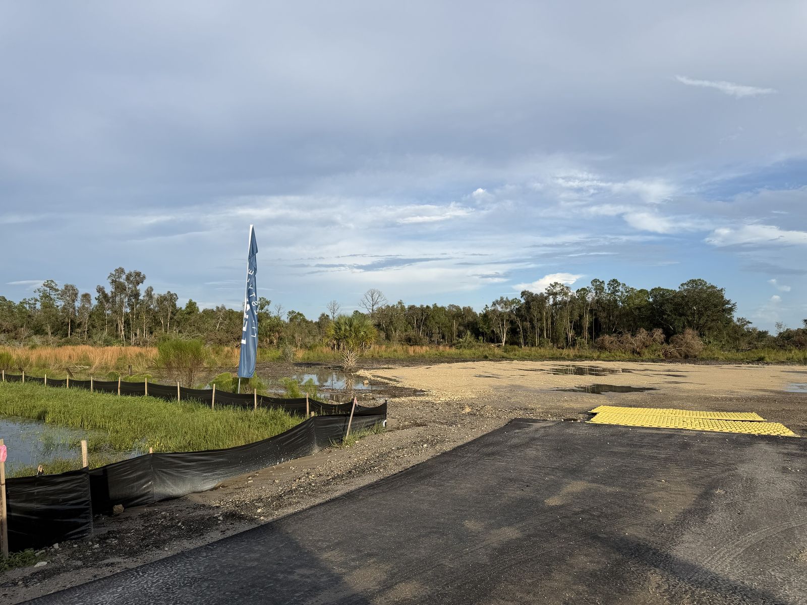 The entrance and the wetland edge with silt fence. Photo: Fernando Daza, October 11, 2026.
